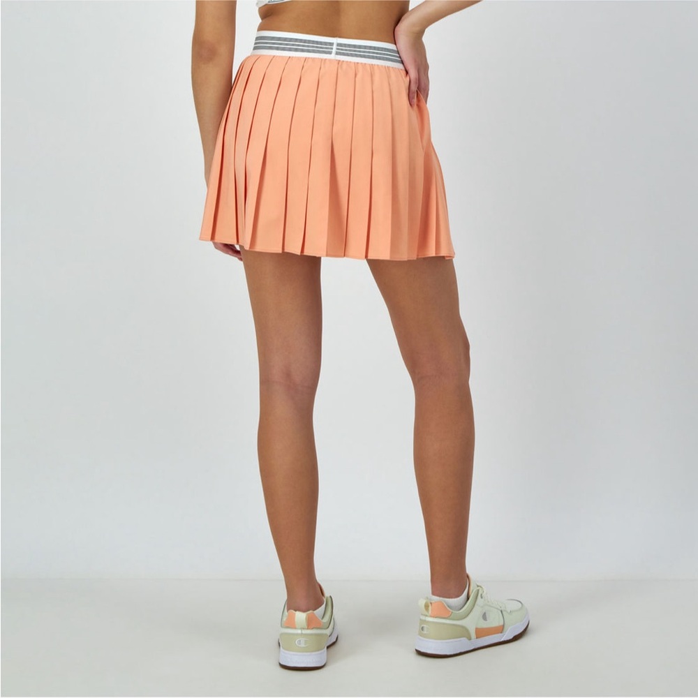 NWT Champion pleated skirt. Color: peach. Size:L